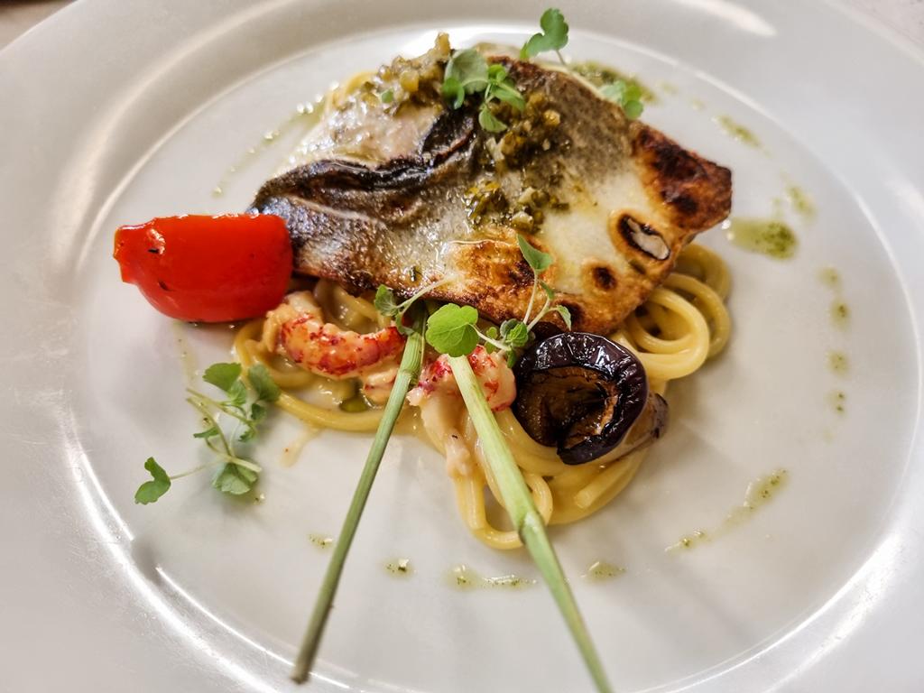Branzino auf Flußkrebsspaghetti